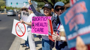 Arizona residents rally for abortion rights.