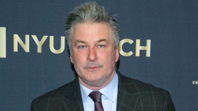 Alec Baldwin and woman confronting