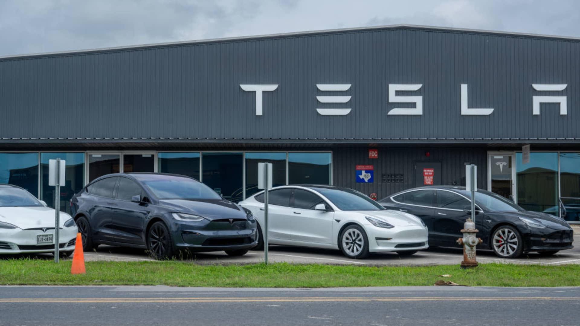 Tesla vehicles sit on the lot at a Tesla dealership on April 15, 2024, in Austin, Texas.